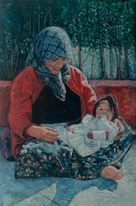 011. Itinerant woman sitting with a baby on her lap